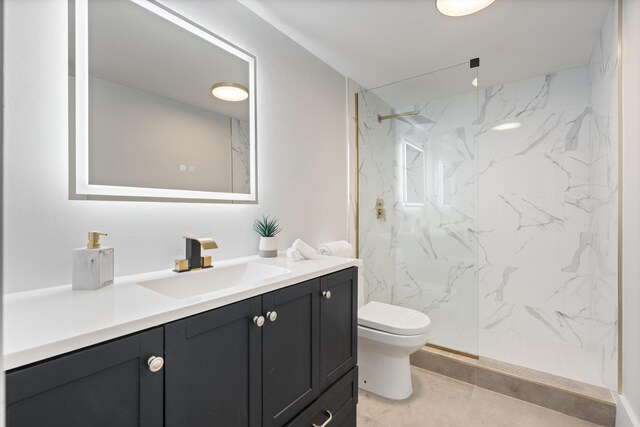 2800 E Sunrise Blvd Unit 4C, Fort Lauderdale, FL 33304 - bathroom featuring toilet, vanity, and a marble finish shower