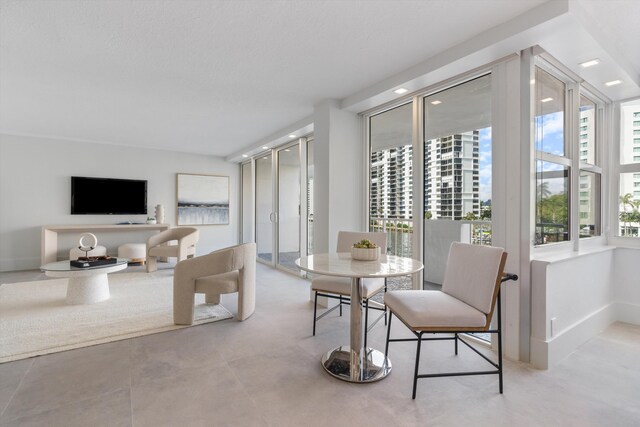 2800 E Sunrise Blvd Unit 4C, Fort Lauderdale, FL 33304 - dining space with baseboards