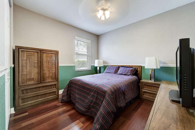 9413 Bristol Ridge Ct, West Palm Beach, FL 33411 - bedroom featuring dark wood-style flooring, a ceiling fan, and baseboards