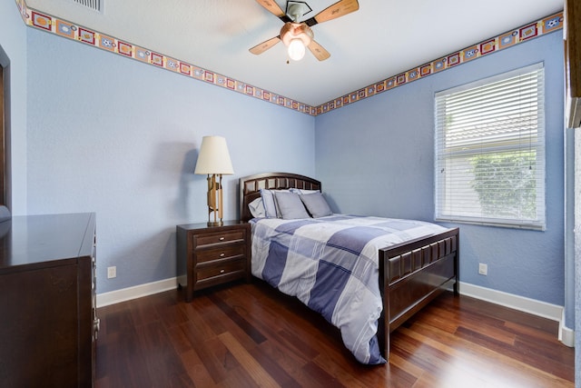 9413 Bristol Ridge Ct, West Palm Beach, FL 33411 - bedroom with wood finished floors, baseboards, and a ceiling fan