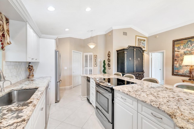 7780 Lake Champlain Ct, Delray Beach, FL 33446 - kitchen featuring appliances with stainless steel finishes, a sink, white cabinets, light stone countertops, and recessed lighting