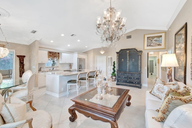 7780 Lake Champlain Ct, Delray Beach, FL 33446 - living room featuring a chandelier, lofted ceiling, ornamental molding, light tile patterned floors, and recessed lighting
