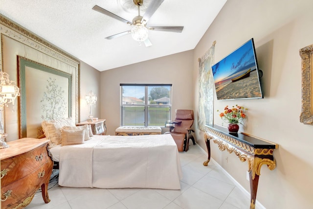 7780 Lake Champlain Ct, Delray Beach, FL 33446 - bedroom featuring lofted ceiling, light tile patterned floors, a ceiling fan, and baseboards