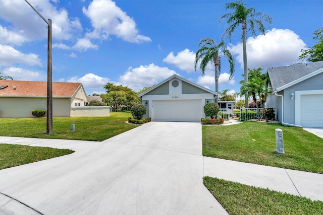 7780 Lake Champlain Ct, Delray Beach, FL 33446 - single story home featuring a front yard, driveway, an attached garage, and stucco siding