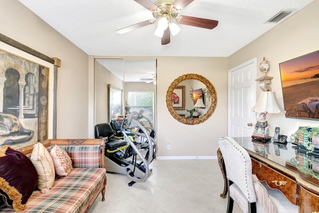 7780 Lake Champlain Ct, Delray Beach, FL 33446 - home office with ceiling fan, light tile patterned flooring, baseboards, and a textured ceiling