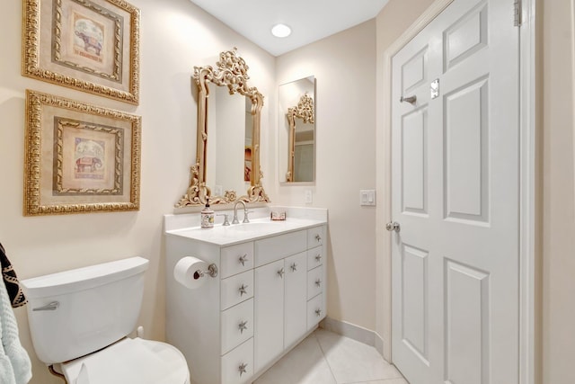 7780 Lake Champlain Ct, Delray Beach, FL 33446 - bathroom featuring vanity, toilet, tile patterned floors, and baseboards