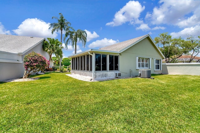 7780 Lake Champlain Ct, Delray Beach, FL 33446 - back of house with a sunroom, central air condition unit, and stucco siding