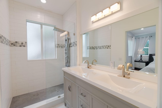 3185 Laurel Ridge Cir, Riviera Beach, FL 33404 - bathroom featuring double vanity, a walk in shower, ensuite bath, and recessed lighting