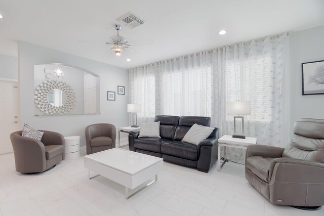3185 Laurel Ridge Cir, Riviera Beach, FL 33404 - living area with light marble finish flooring, a ceiling fan, and recessed lighting