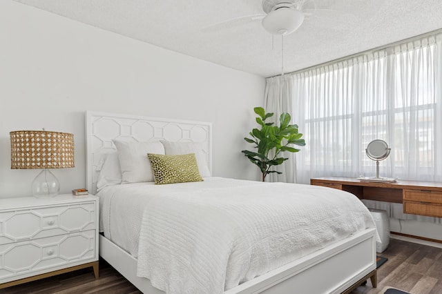 911 Gardenia Dr Unit 252, Delray Beach, FL 33483 - bedroom with dark wood-type flooring and ceiling fan