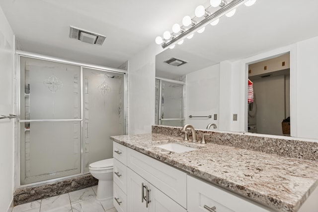 911 Gardenia Dr Unit 252, Delray Beach, FL 33483 - full bathroom with marble look tile flooring, a shower stall, toilet, and vanity