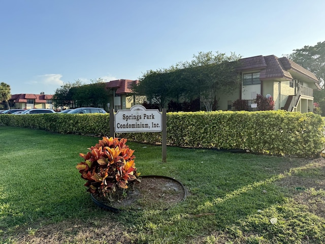 3280 NW 104th Ave Unit 3280, Coral Springs, FL 33065 - community / neighborhood sign featuring a lawn