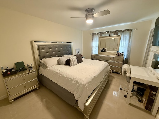 3280 NW 104th Ave Unit 3280, Coral Springs, FL 33065 - bedroom with ceiling fan and light tile patterned flooring