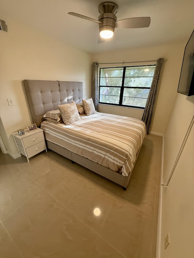 3280 NW 104th Ave Unit 3280, Coral Springs, FL 33065 - tiled bedroom with a ceiling fan