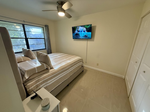 3280 NW 104th Ave Unit 3280, Coral Springs, FL 33065 - bedroom featuring baseboards and a ceiling fan