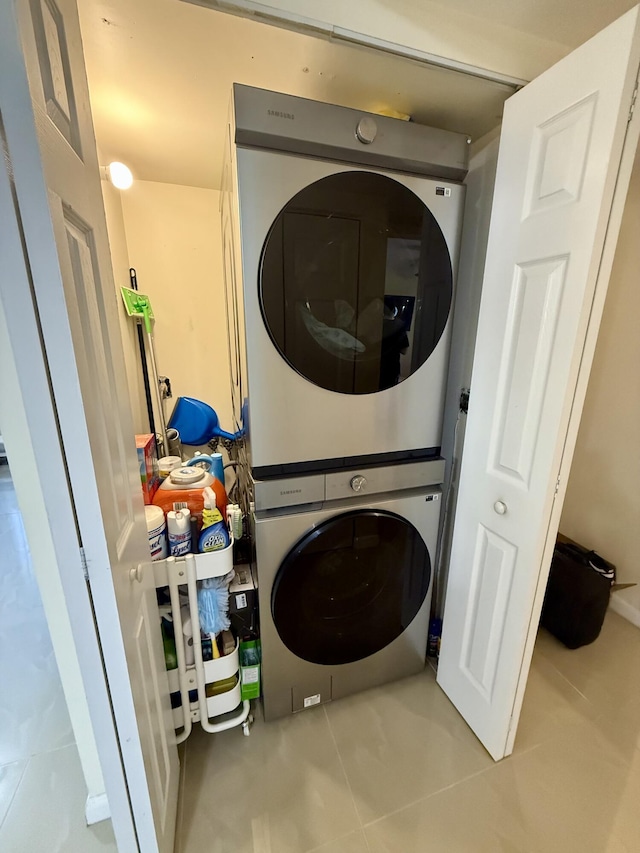 3280 NW 104th Ave Unit 3280, Coral Springs, FL 33065 - washroom featuring estacked washer and dryer and tile patterned flooring