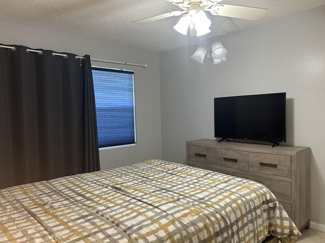 105 Sheffield E, West Palm Beach, FL 33417 - bedroom featuring a textured ceiling and ceiling fan