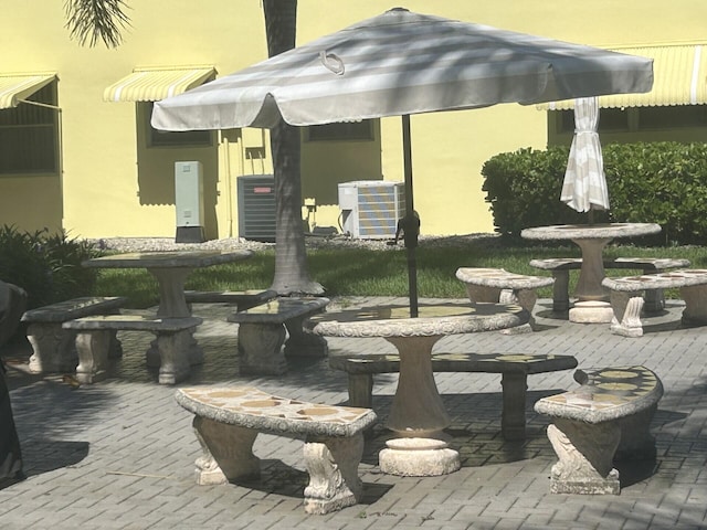 105 Sheffield E, West Palm Beach, FL 33417 - view of patio featuring central AC