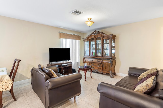 6815 Farragut Ln, Boynton Beach, FL 33437 - living room with light tile patterned floors and baseboards