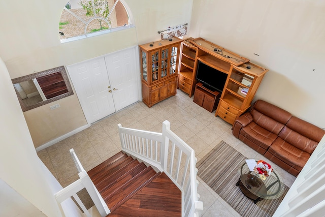 6815 Farragut Ln, Boynton Beach, FL 33437 - tiled living room with a high ceiling and stairway