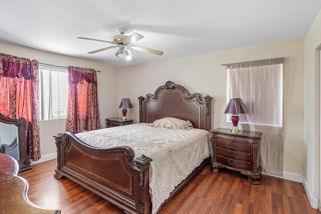 6815 Farragut Ln, Boynton Beach, FL 33437 - bedroom featuring dark wood-style flooring, baseboards, and ceiling fan