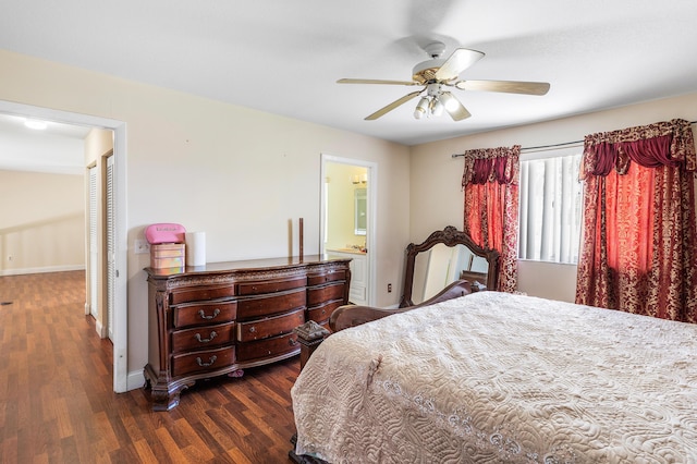 6815 Farragut Ln, Boynton Beach, FL 33437 - bedroom featuring dark wood-type flooring, baseboards, connected bathroom, and a ceiling fan