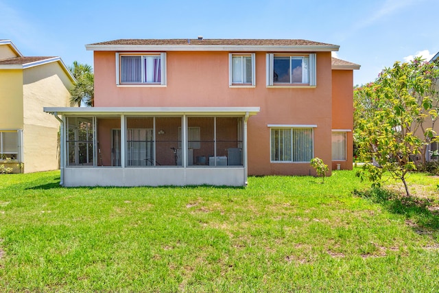 6815 Farragut Ln, Boynton Beach, FL 33437 - back of house with a sunroom, a yard, and stucco siding