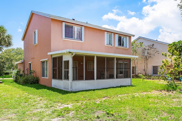 6815 Farragut Ln, Boynton Beach, FL 33437 - rear view of property with a sunroom, a yard, and stucco siding