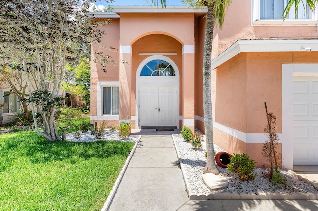 6815 Farragut Ln, Boynton Beach, FL 33437 - entrance to property with stucco siding and a yard
