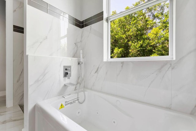 675 NE Moss Rose Pl, Port Saint Lucie, FL 34983 - full bath featuring a combined bath / shower with jetted tub
