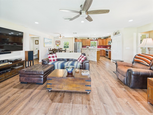 32801 US Highway 441 13 & 14, Okeechobee, FL 34972 - living room with a ceiling fan, light wood finished floors, and recessed lighting