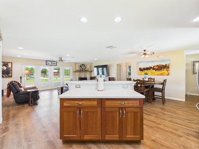 32801 US Highway 441 13 & 14, Okeechobee, FL 34972 - kitchen with a ceiling fan, open floor plan, light countertops, and recessed lighting