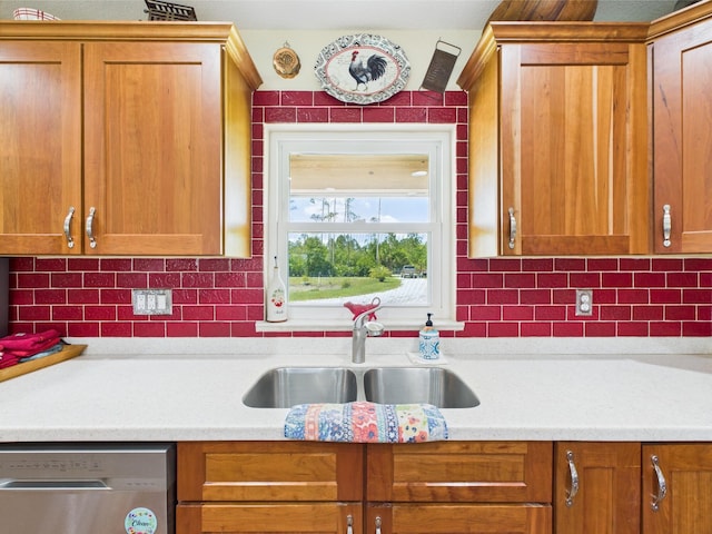 32801 US Highway 441 13 & 14, Okeechobee, FL 34972 - kitchen with stainless steel dishwasher, a sink, light countertops, brown cabinets, and tasteful backsplash