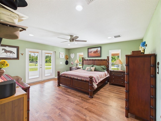 32801 US Highway 441 13 & 14, Okeechobee, FL 34972 - bedroom featuring access to outside, french doors, light wood finished floors, ceiling fan, and recessed lighting