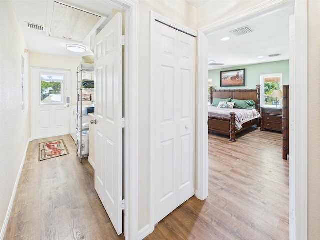 32801 US Highway 441 13 & 14, Okeechobee, FL 34972 - corridor featuring wood finished floors and plenty of natural light
