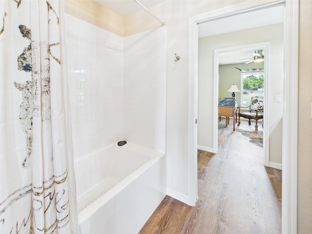 32801 US Highway 441 13 & 14, Okeechobee, FL 34972 - full bath featuring wood finished floors, shower / bath combo with shower curtain, baseboards, and ceiling fan