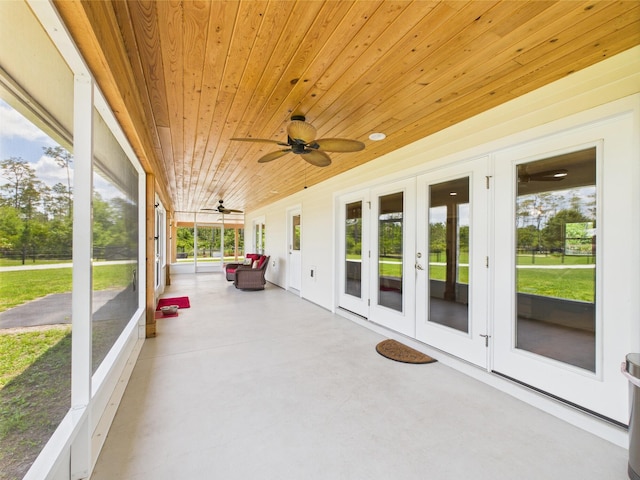 32801 US Highway 441 13 & 14, Okeechobee, FL 34972 - unfurnished sunroom featuring french doors, healthy amount of natural light, and ceiling fan