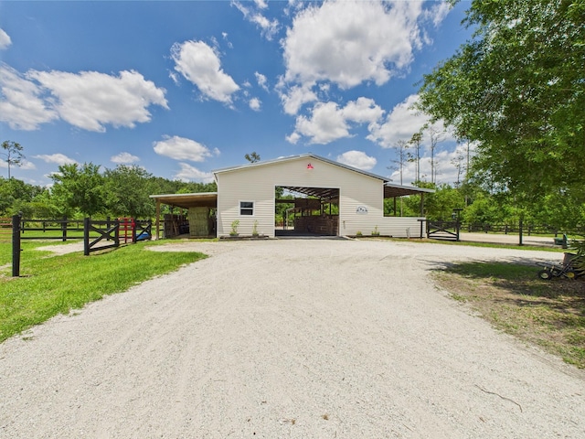 32801 US Highway 441 13 & 14, Okeechobee, FL 34972 - view of home's exterior with an outbuilding and an exterior structure