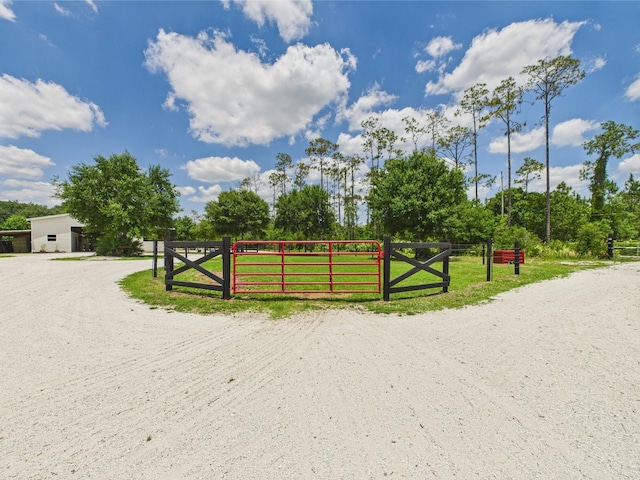 32801 US Highway 441 13 & 14, Okeechobee, FL 34972 - view of home's community with a gate