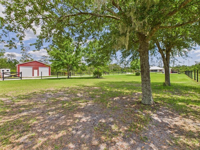 32801 US Highway 441 13 & 14, Okeechobee, FL 34972 - view of yard with a garage and an outdoor structure