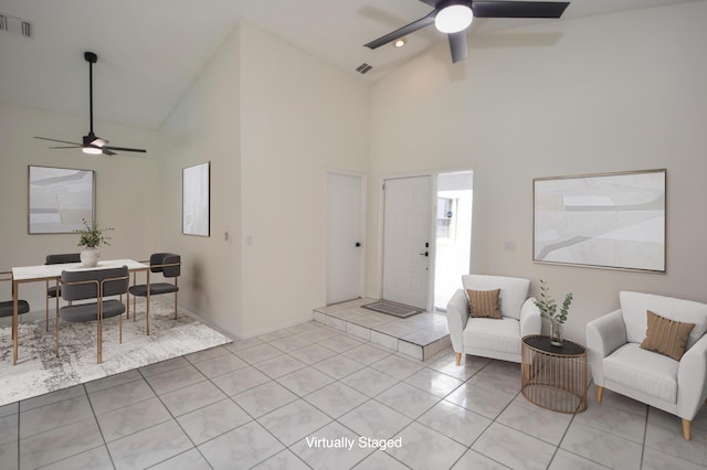 11405 Whisper Lake Way, Boca Raton, FL 33428 - living area featuring ceiling fan, high vaulted ceiling, light tile patterned floors, and baseboards