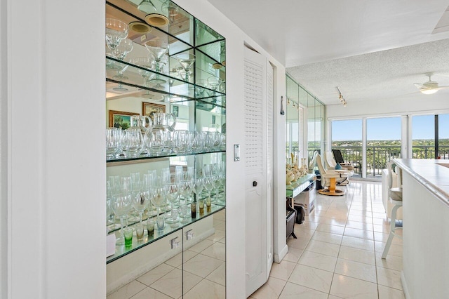 2611 N Riverside Dr Unit 908, Pompano Beach, FL 33062 - indoor dry bar featuring a textured ceiling