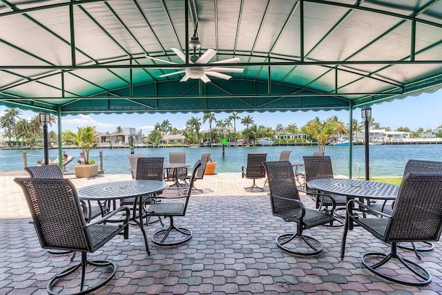 2611 N Riverside Dr Unit 908, Pompano Beach, FL 33062 - view of patio featuring a ceiling fan and a water view