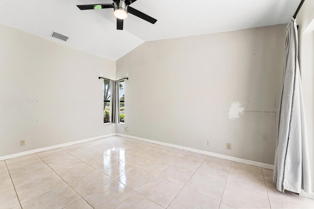 2561 Carambola Cir N Unit 1848Bldg 8, Coconut Creek, FL 33066 - spare room featuring ceiling fan, lofted ceiling, light tile patterned flooring, and baseboards
