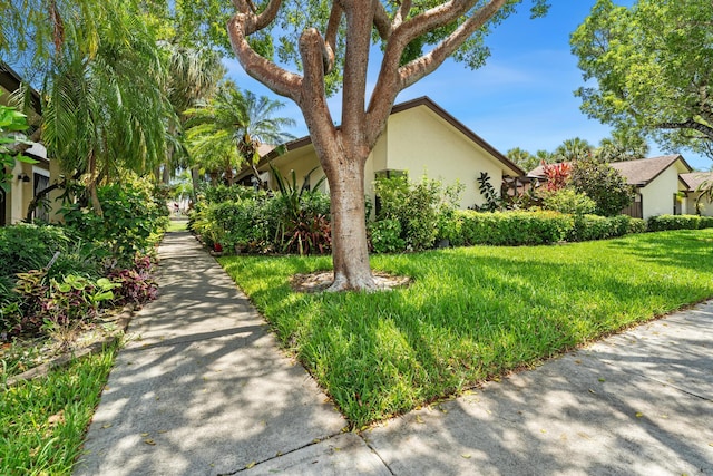2561 Carambola Cir N Unit 1848Bldg 8, Coconut Creek, FL 33066 - view of side of property with stucco siding