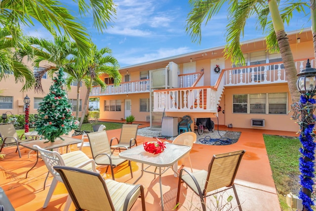 332 Sheffield N, West Palm Beach, FL 33417 - view of patio / terrace with stairs and outdoor dining area