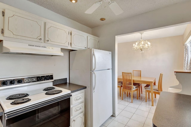 332 Sheffield N, West Palm Beach, FL 33417 - kitchen with electric range oven, under cabinet range hood, freestanding refrigerator, a ceiling fan, and dark countertops