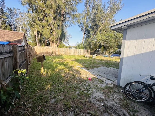 2002 N 50th St, Fort Pierce, FL 34947 - view of yard with a patio area