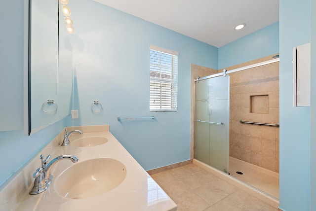 259 SW 7th Ct, Pompano Beach, FL 33060 - bathroom with tile patterned floors, tiled shower, double vanity, and baseboards