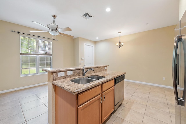 259 SW 7th Ct, Pompano Beach, FL 33060 - kitchen with a sink, appliances with stainless steel finishes, light tile patterned floors, ceiling fan, and baseboards
